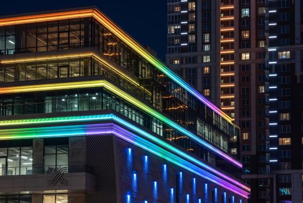 LED wall washer light illuminating a modern architectural facade
